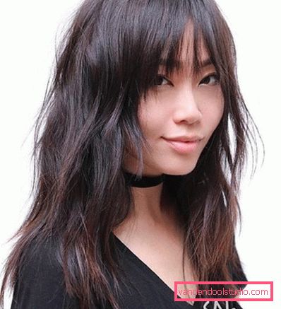 female haircut cascade with bangs