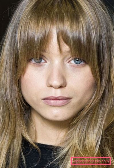 female haircut cascade with bangs