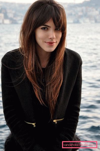 female haircut cascade with bangs