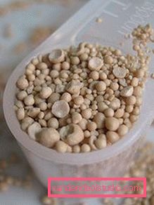 granules in a measuring pan