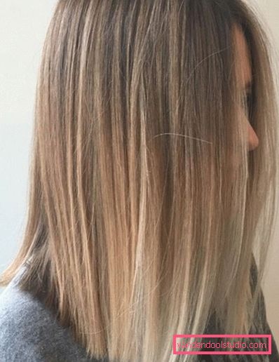 Fashionable dyeing of dark and light hair in the style of shatush