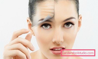 girl removes wrinkles from the face girl removes wrinkles from the face
