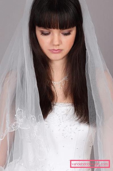 Wedding hairstyles with a veil on medium