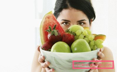 girl holding fruit